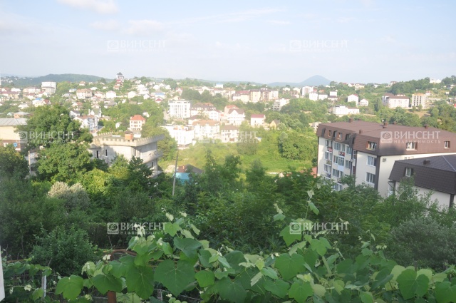 Участок с видом на горы и море