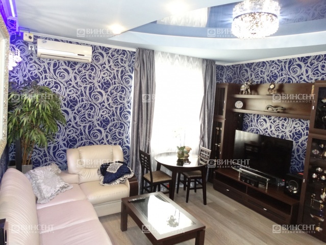 Четырехкомнатная квартира в центре