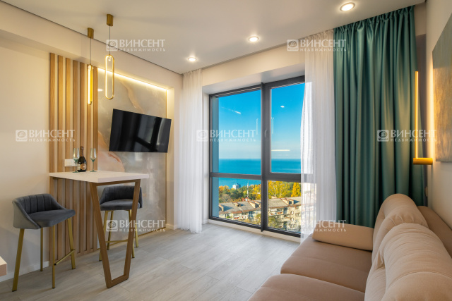 Панорамная студия с видом на море